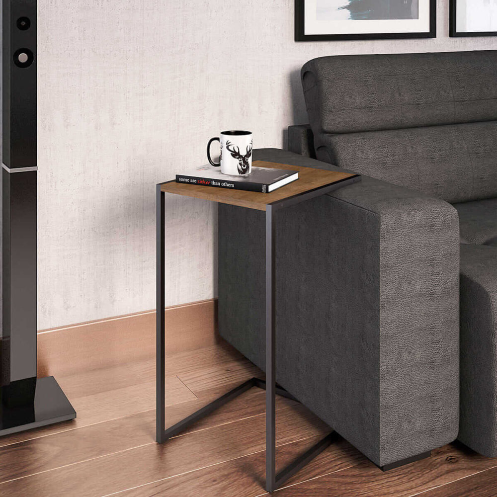 C-shape Side Table over a sofa. Made of wood and black steel legs